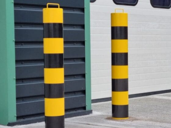 Steel anti ram bollards protecting the front entrance of a building