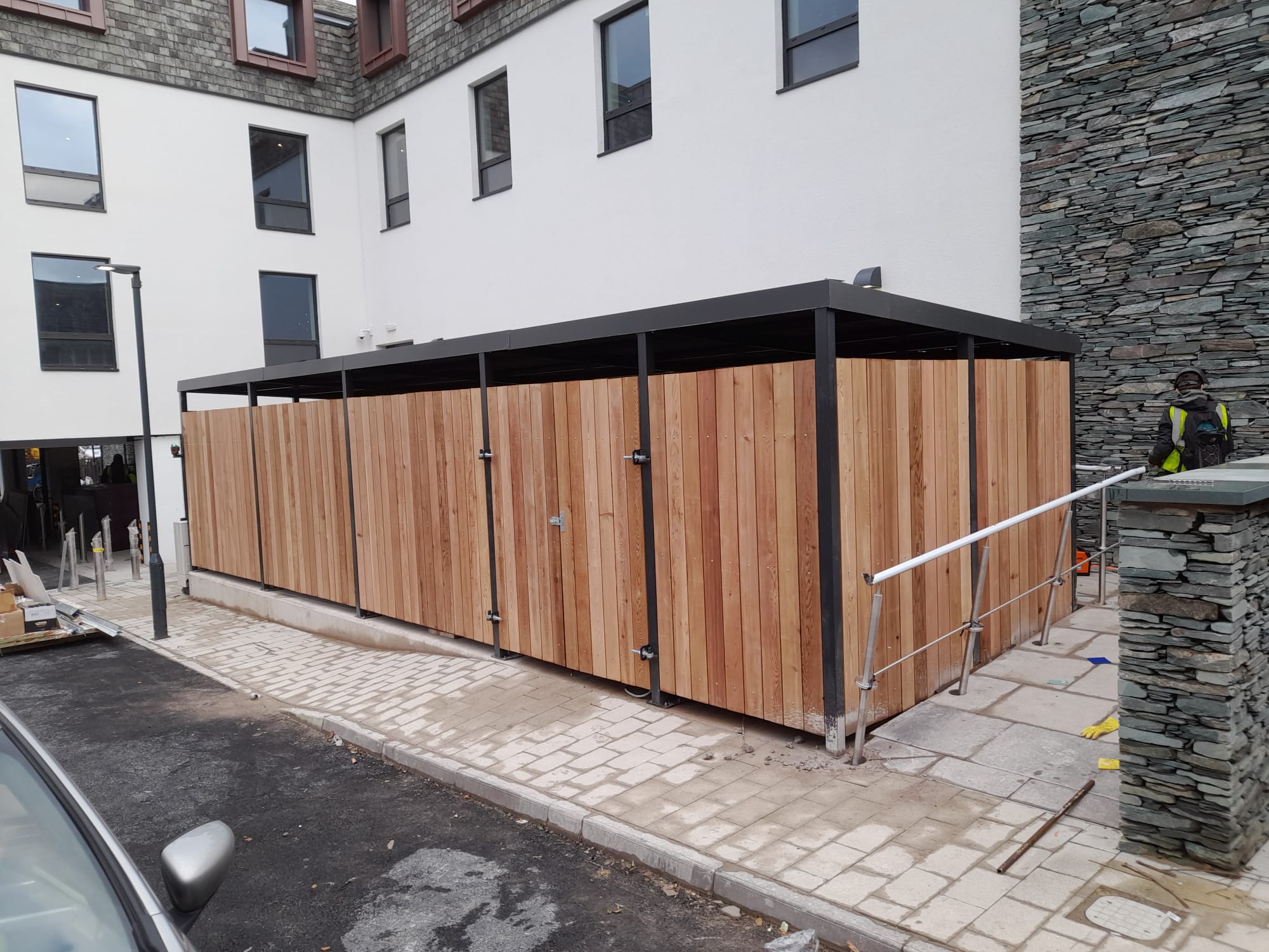 Red cedar commercial bin store with steel roof